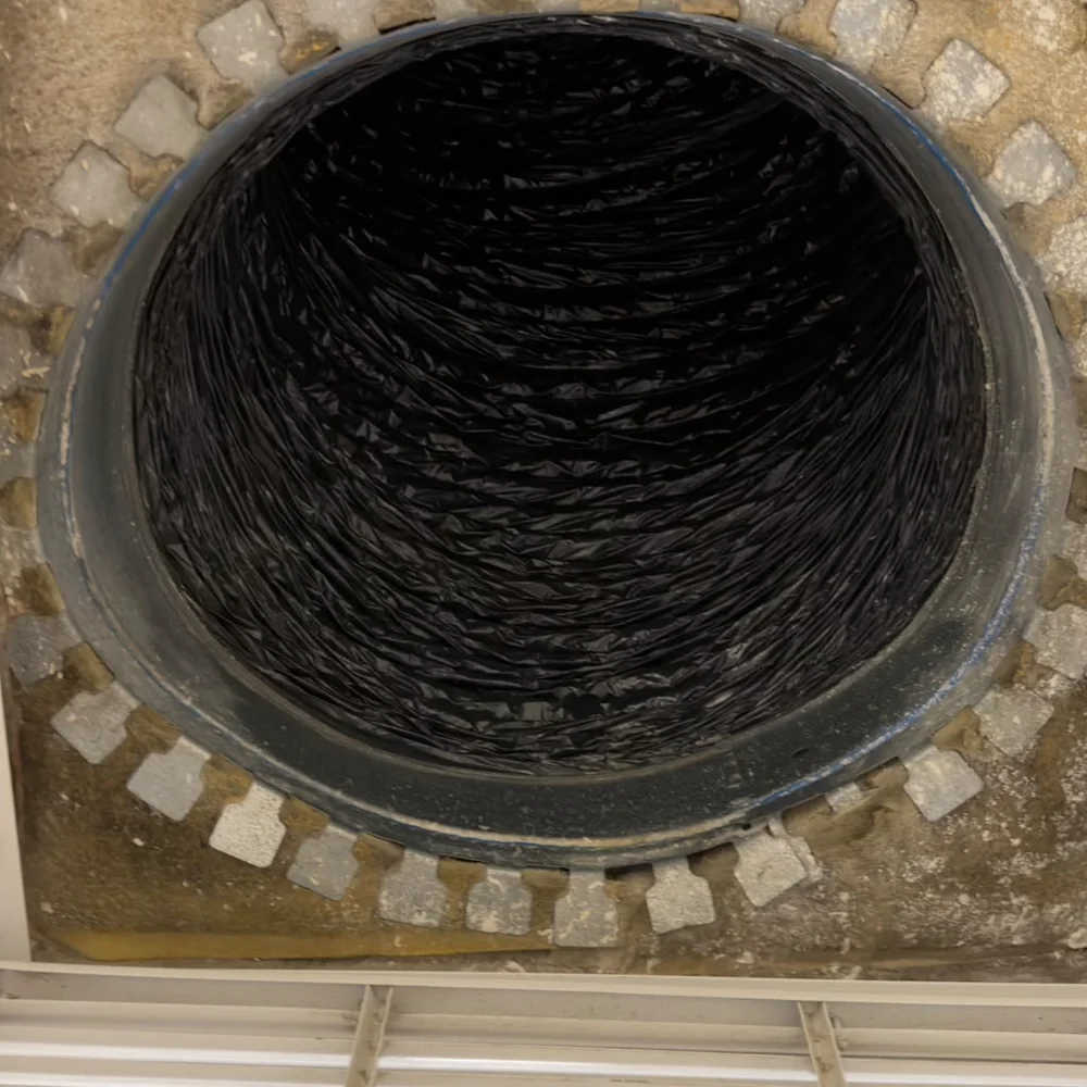 Round duct interior after cleaning