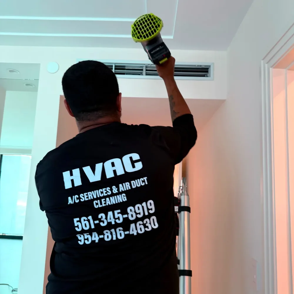 HVAC Solution technician working on air vent with professional equipment
