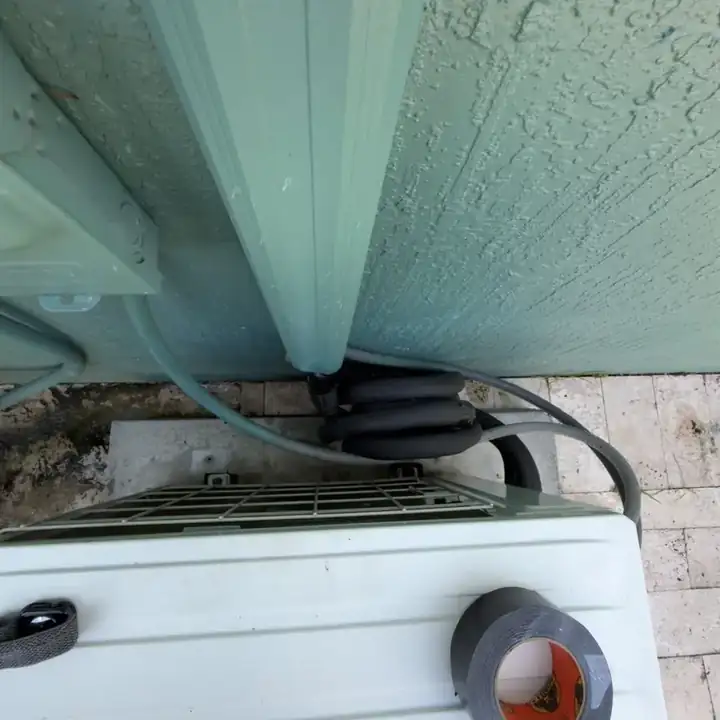 Mini split system being professionally cleaned and serviced