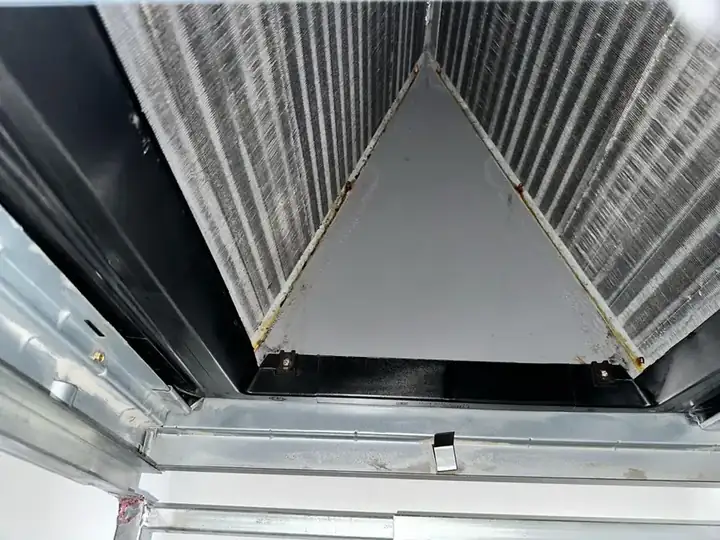 AC coil access area during professional cleaning service